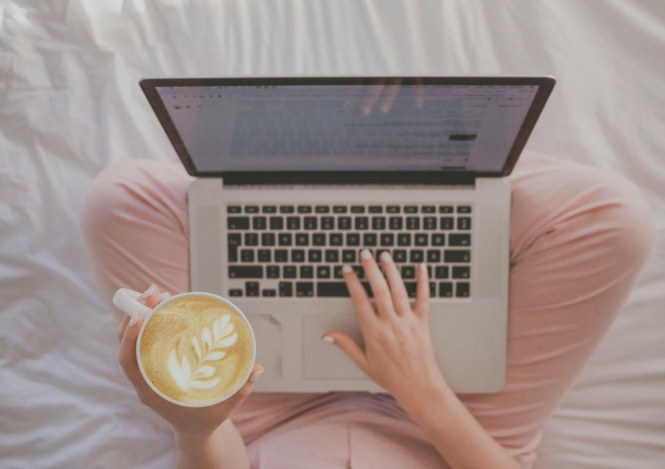 Financial planning professional reviewing investment portfolios with client documents