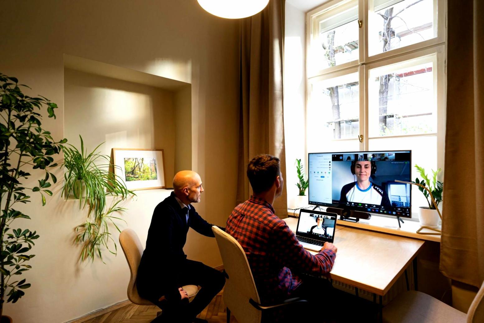 Modern financial planning office with technology integration and comfortable client spaces